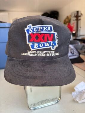 Vintage NFL Black Cap with Red and Blue Shield Tag